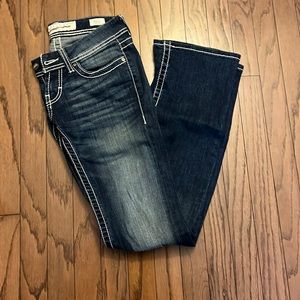 Buckle Stella low rise boot cut jeans.